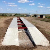 Автомобільні бетонні ваги на 80 тонн 12 метрів на аналогових датчиках